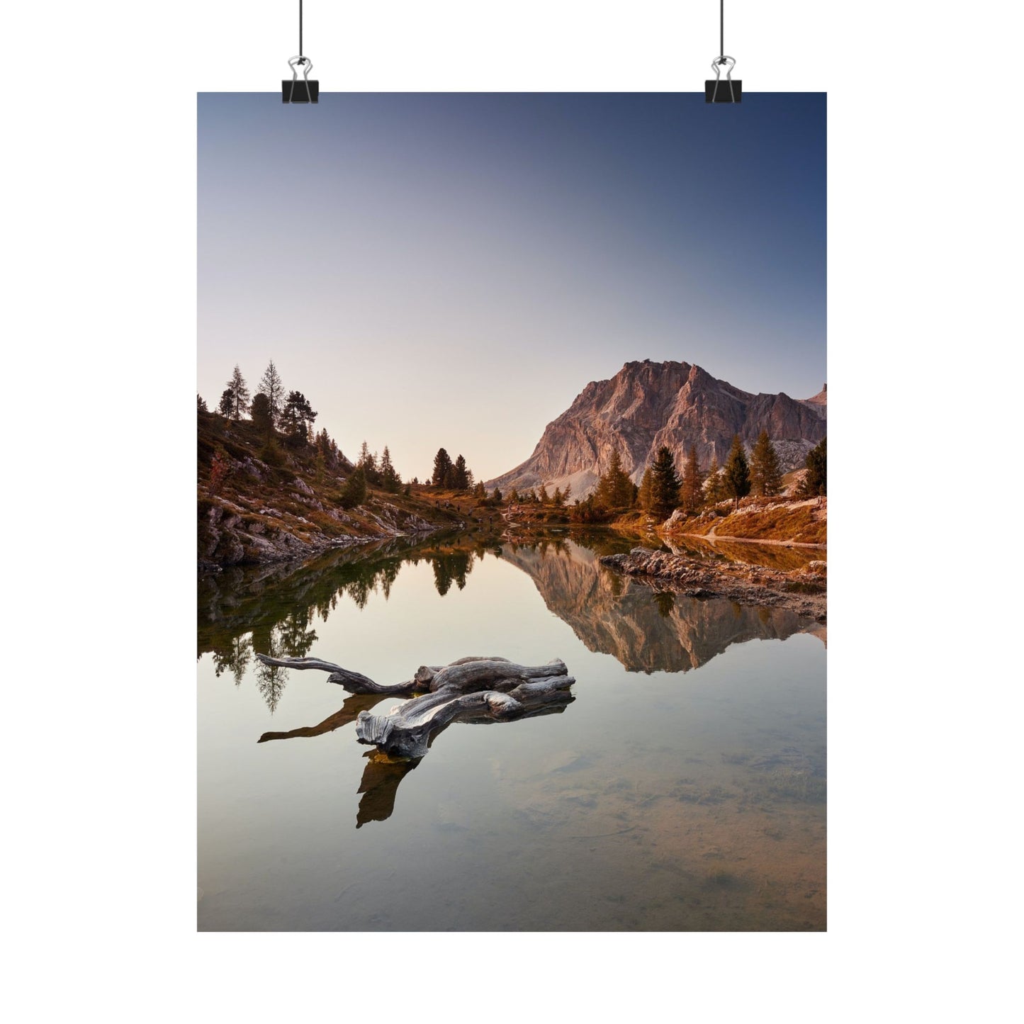 Mountain landscape with a lake and reflection, with a poster frame on a white background.