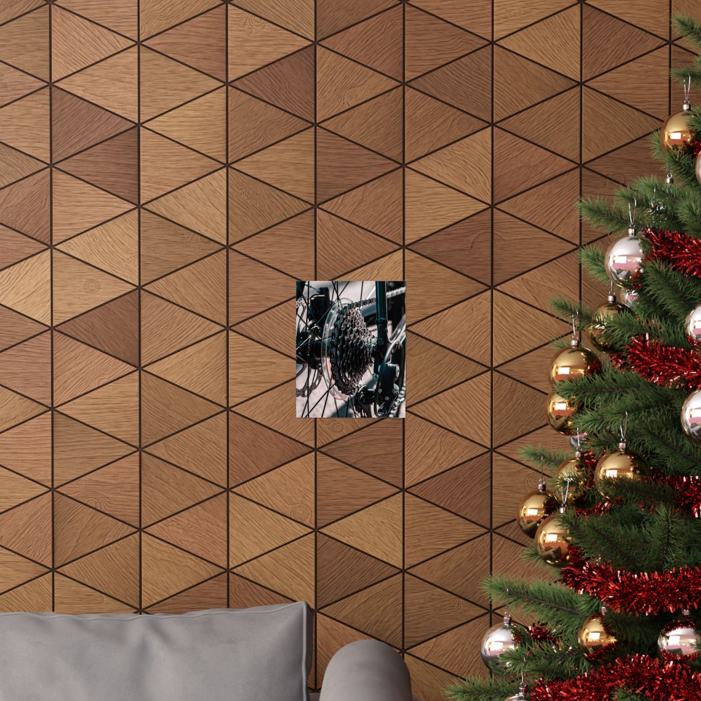 Wooden wall paneling with a geometric pattern next to a decorated Christmas tree.