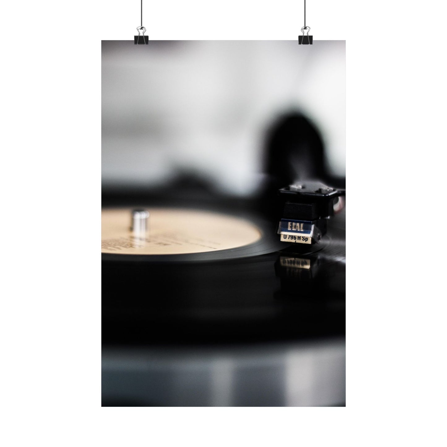 Vinyl record and turntable on a white background