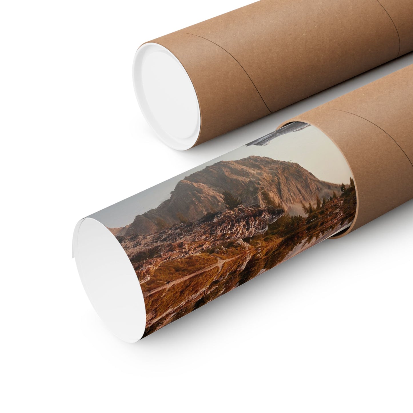 Roll of paper with a mountain landscape design on a white background