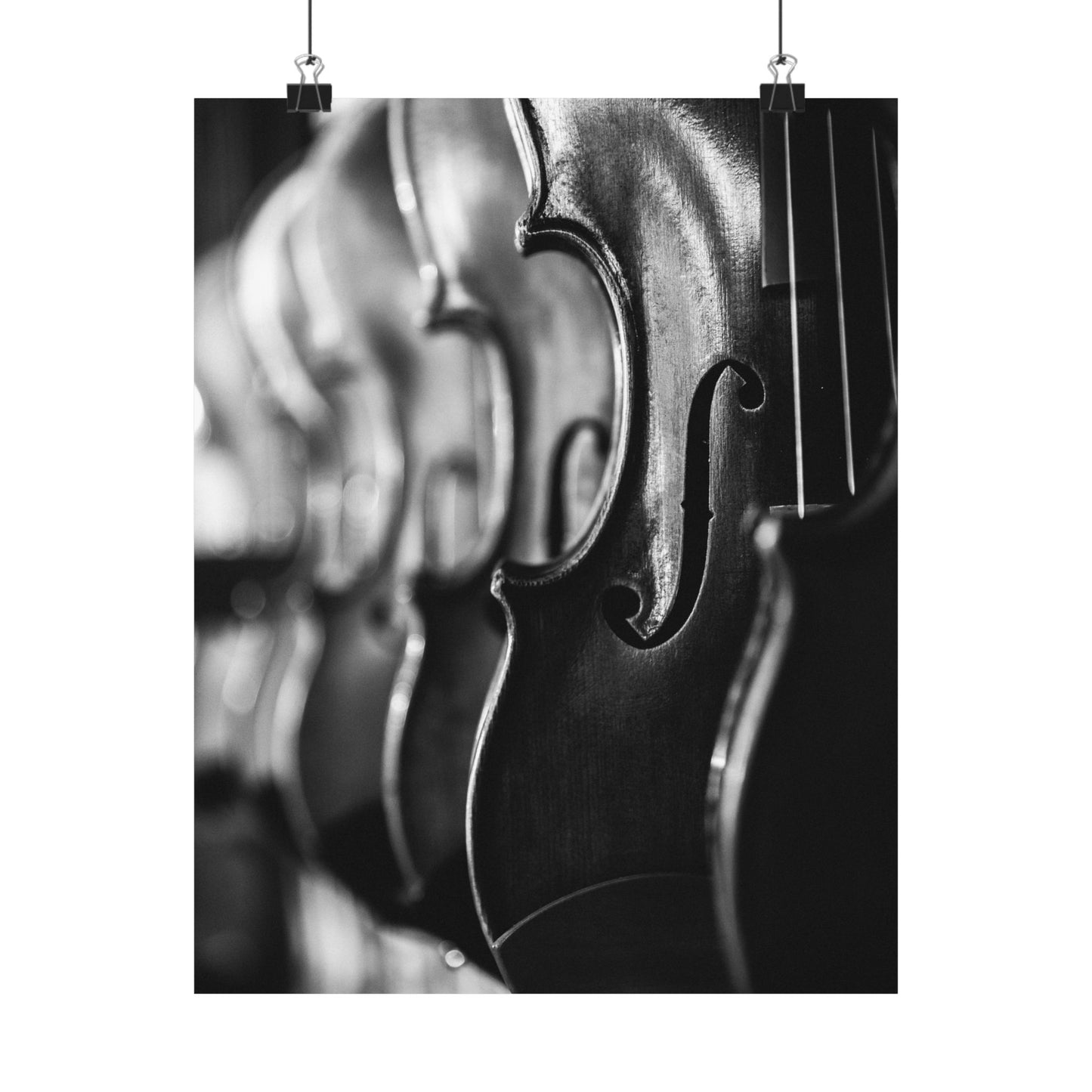 Close-up of a violin's f-hole in black and white