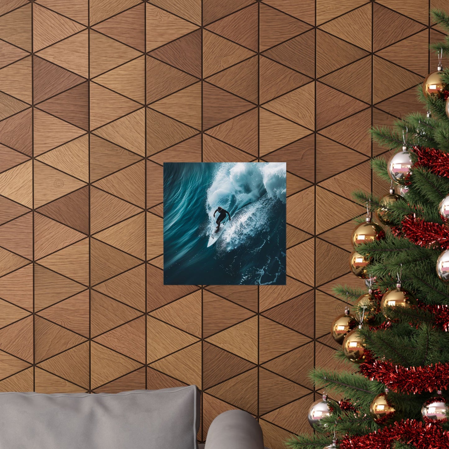 Wooden wall with a framed picture of a surfer and a decorated Christmas tree.