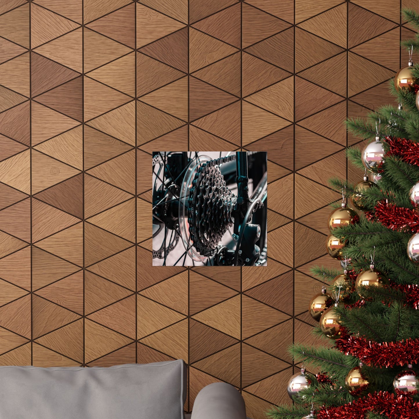 Decorative wall with geometric pattern, framed picture, and Christmas tree with ornaments.