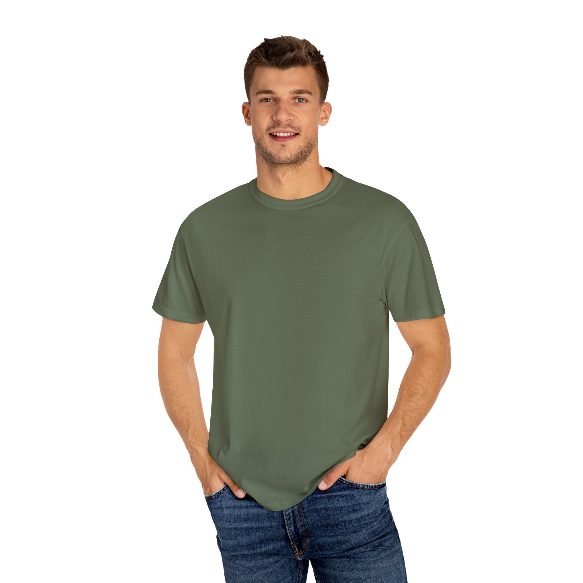 Man wearing a green t-shirt and blue jeans on a white background