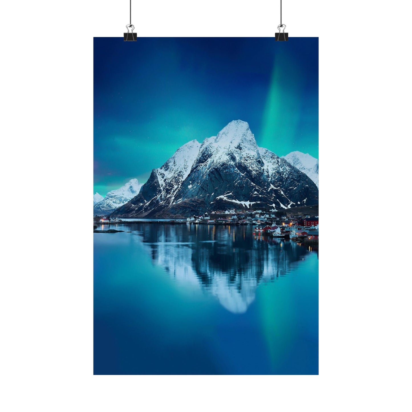 Poster of a mountain reflection in water with a blue sky.