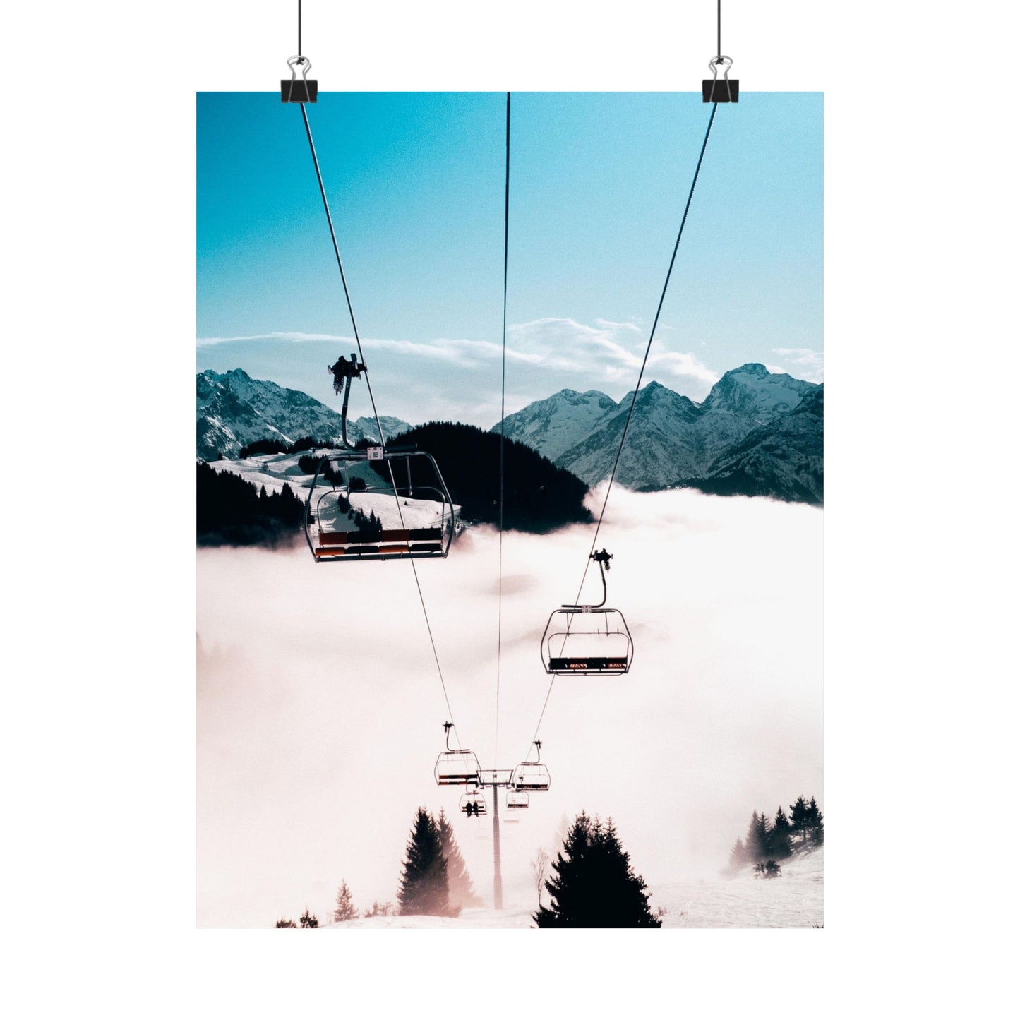 Ski lift with mountain and cloud background