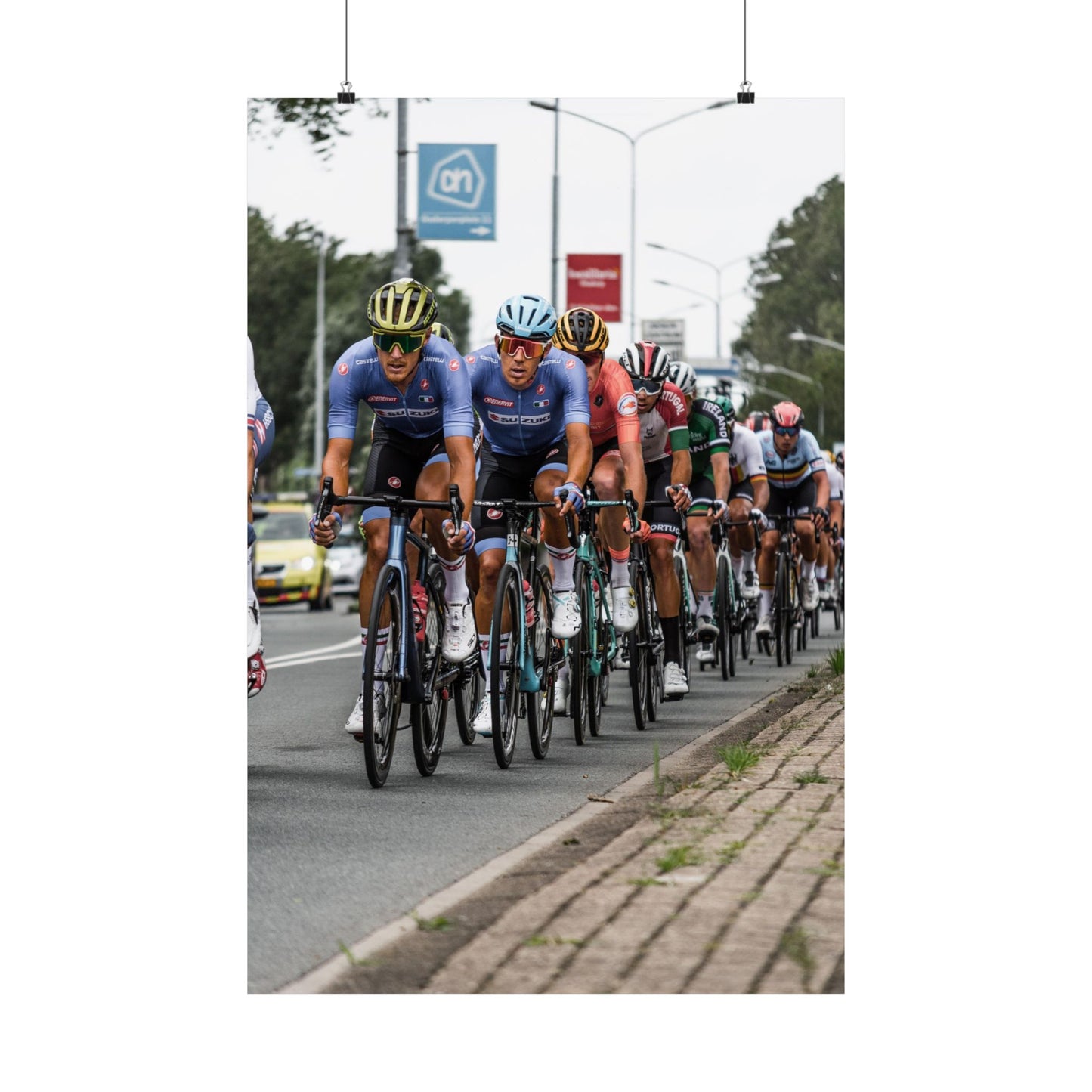 Cycling race with multiple cyclists on a road