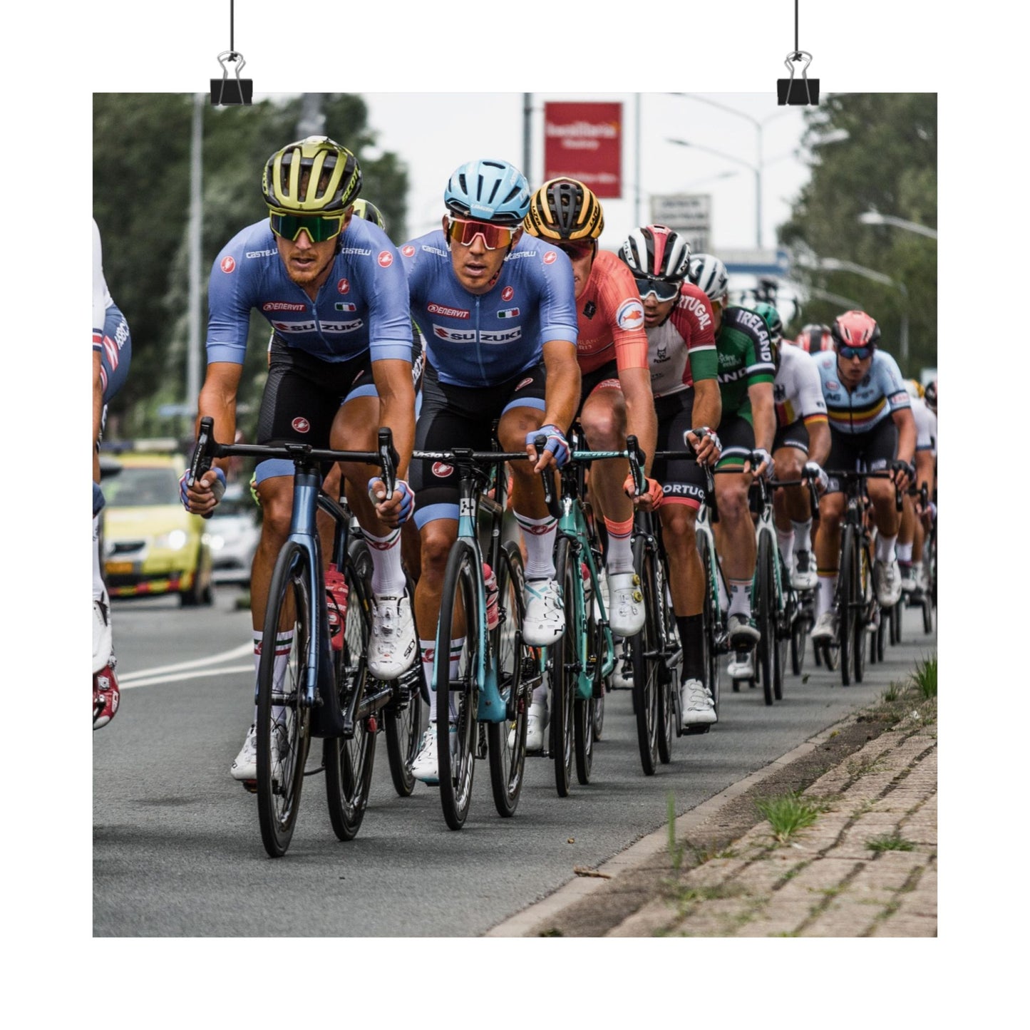 Cycling race with multiple cyclists on a road