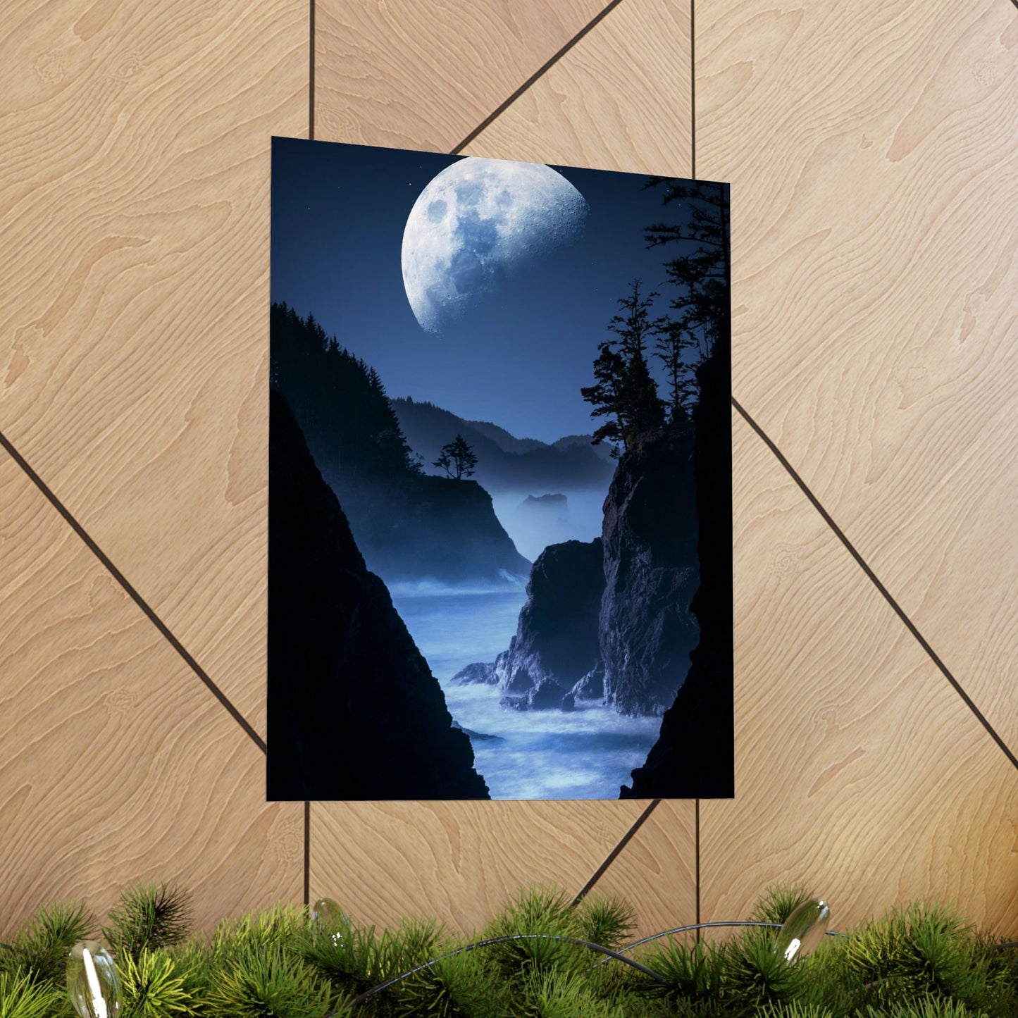 Poster of a moonlit coastal scene on a wooden floor.