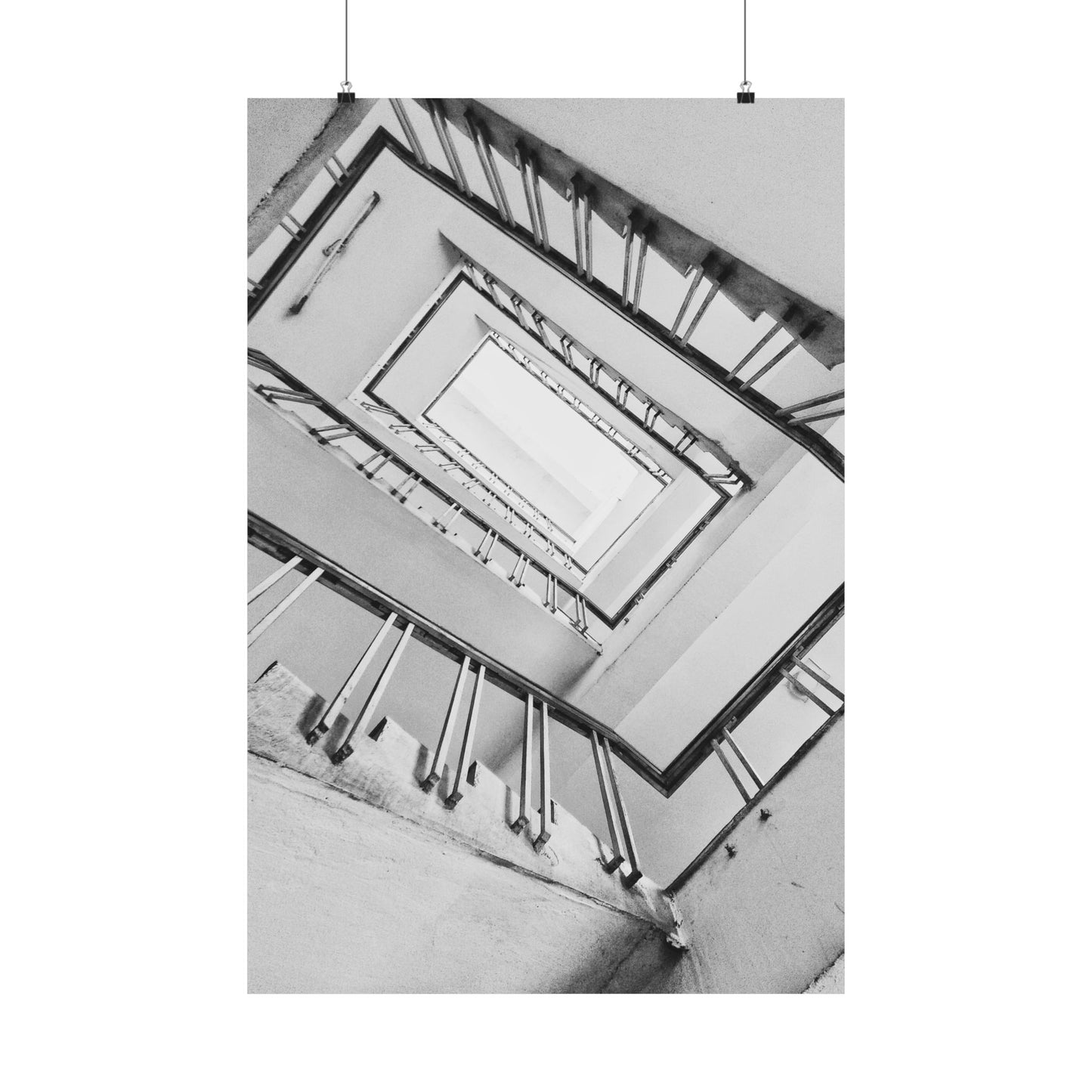Black and white photo of a staircase with multiple levels.