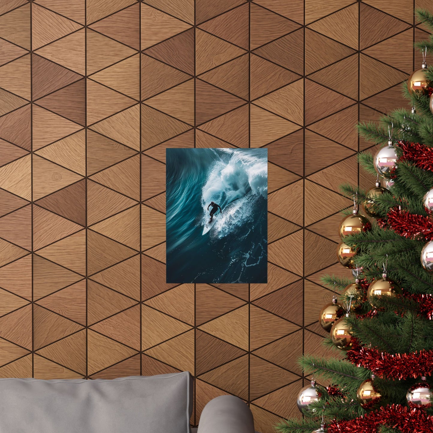 Wooden wall with geometric pattern, framed artwork of a surfer, and a decorated Christmas tree.