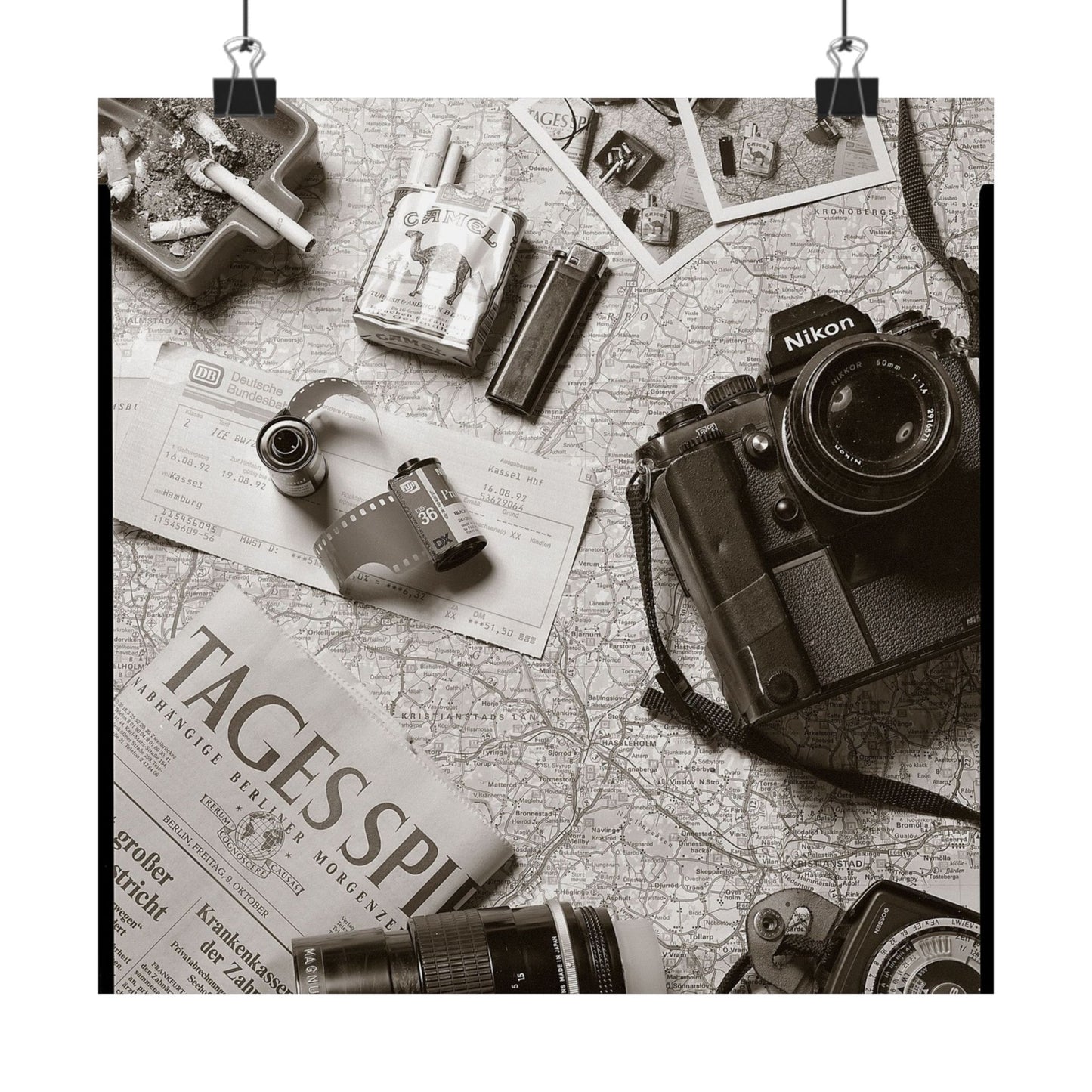 Vintage camera and film equipment on a map background