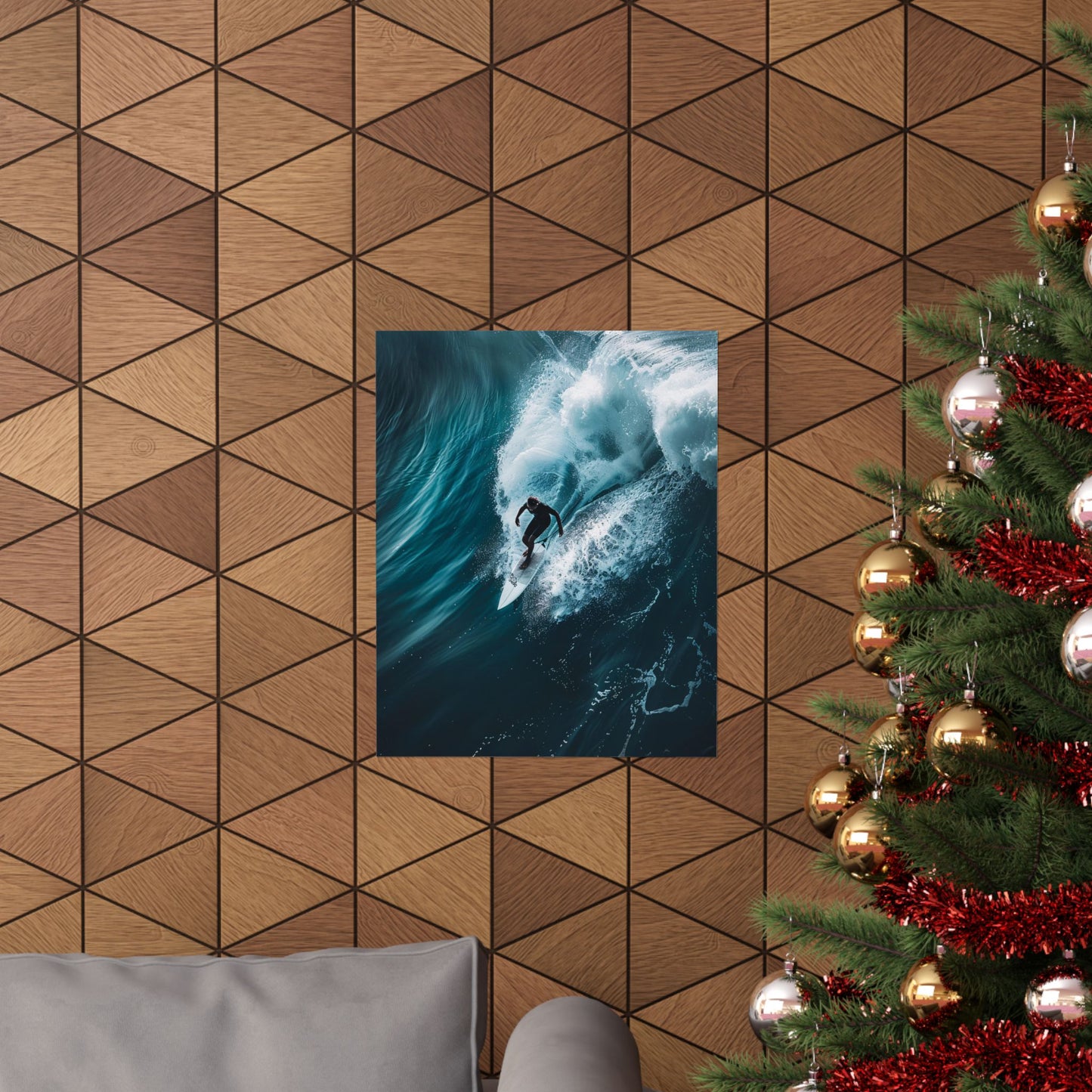 Poster of a surfer on a wave above a geometric-patterned wall with a Christmas tree to the right.