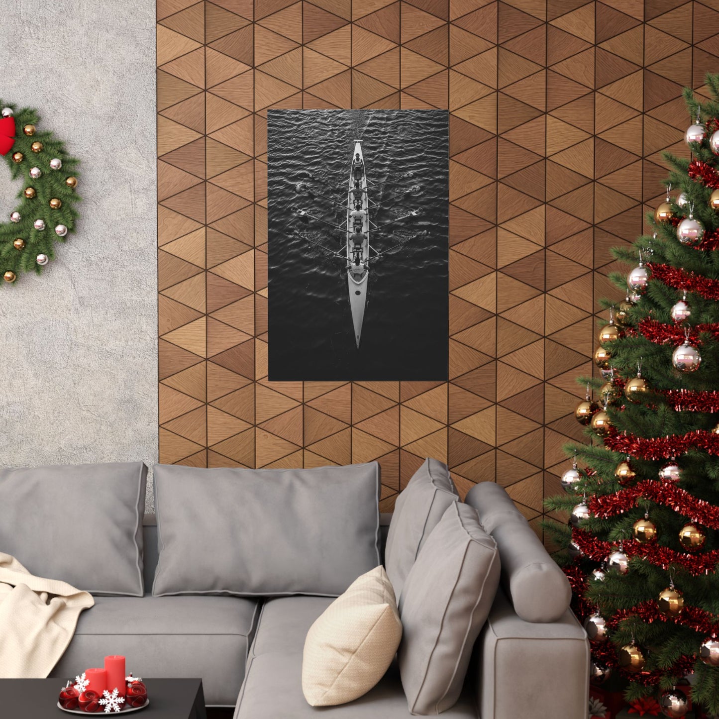 Living room with a geometric-patterned wall, Christmas tree, and sectional sofa.