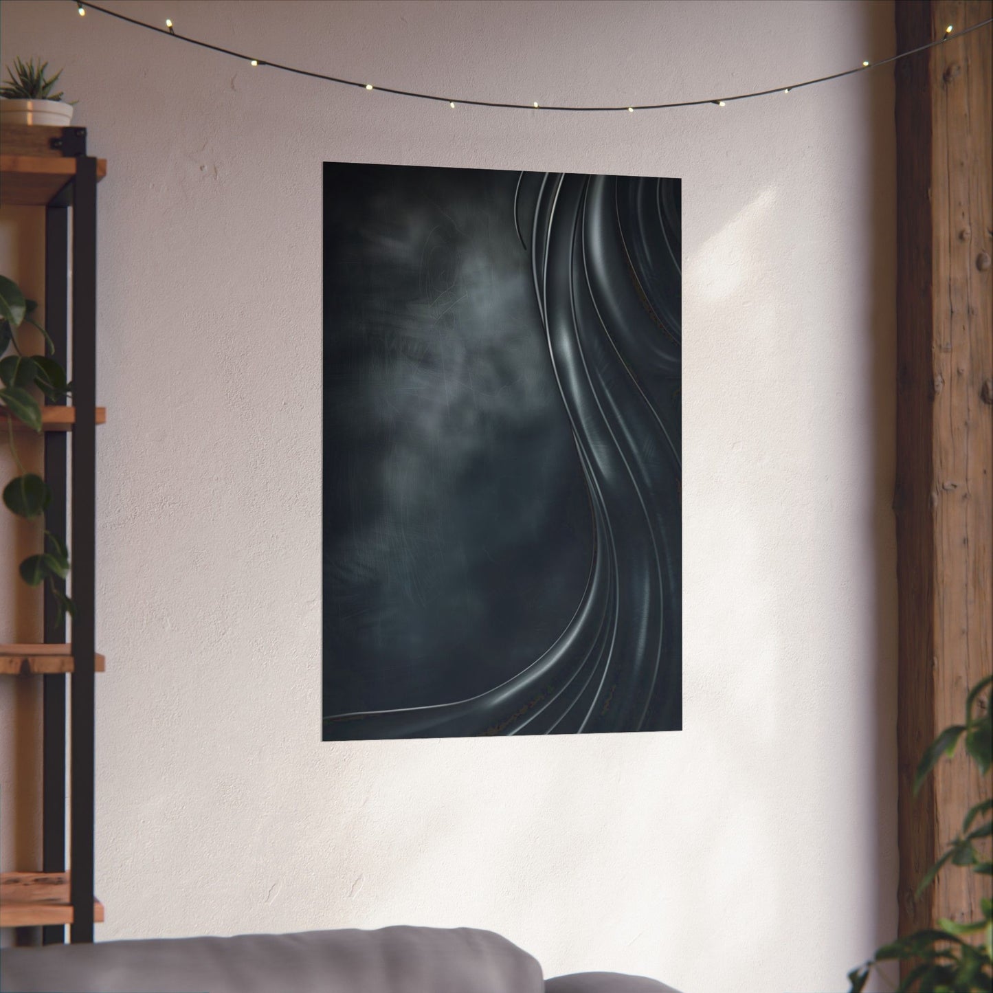 Abstract wall tapestry with wavy lines on a white wall in a room with a shelf and plants.