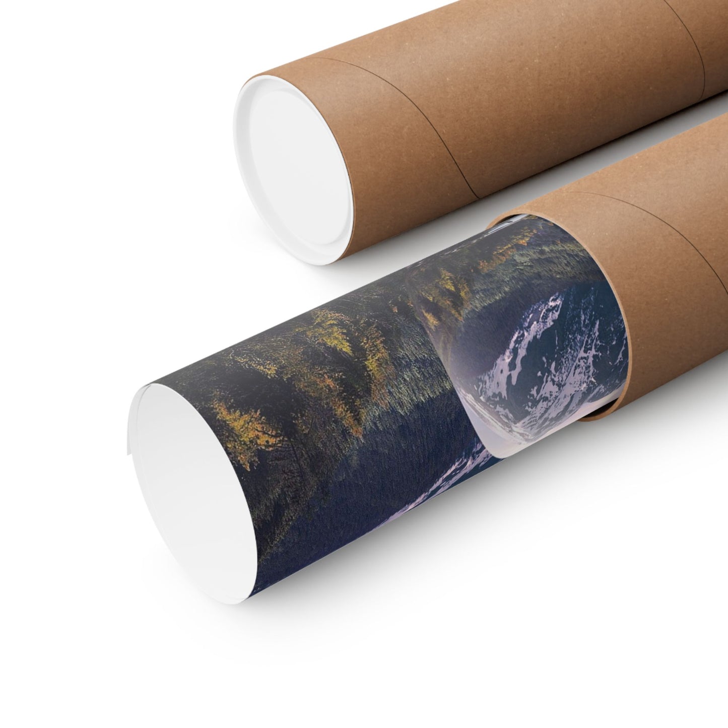 Two rolls of paper with scenic designs on a white background