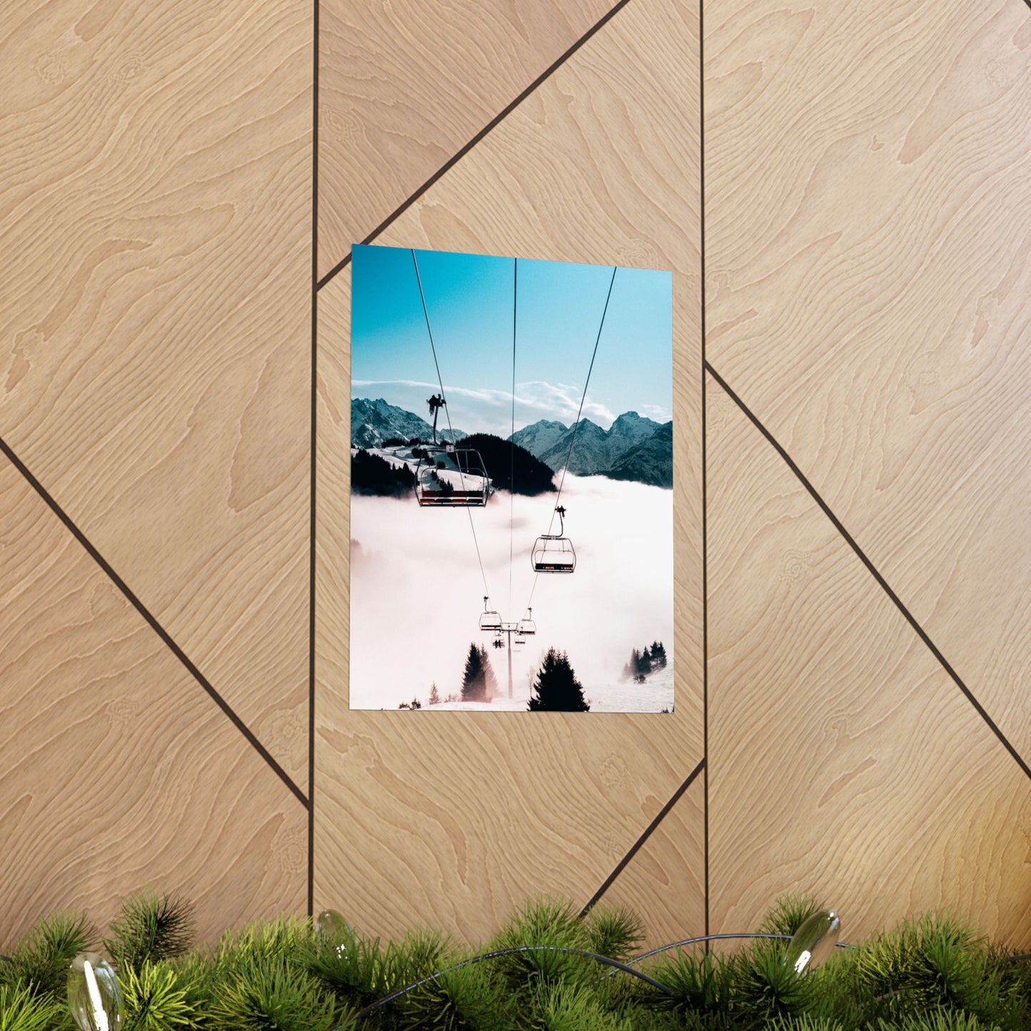 Framed picture of a snowy mountain landscape with a ski lift on a wooden wall.