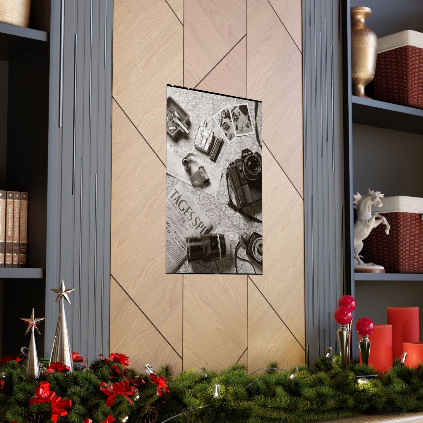 Decorative wall art with vintage cameras on a textured background, displayed in a room with festive decorations.