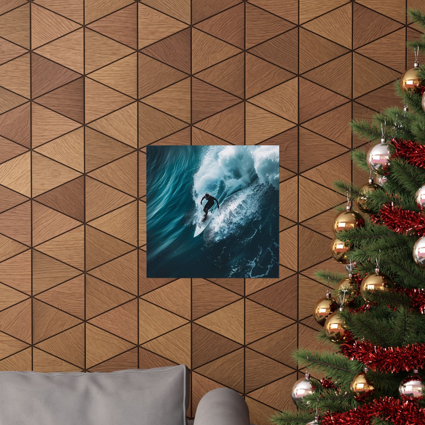 Wooden wall with a framed picture of a surfer and a Christmas tree with decorations.