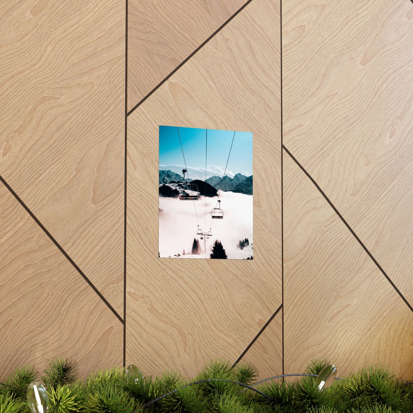 Ski lift in a snowy landscape framed by wooden panels and greenery