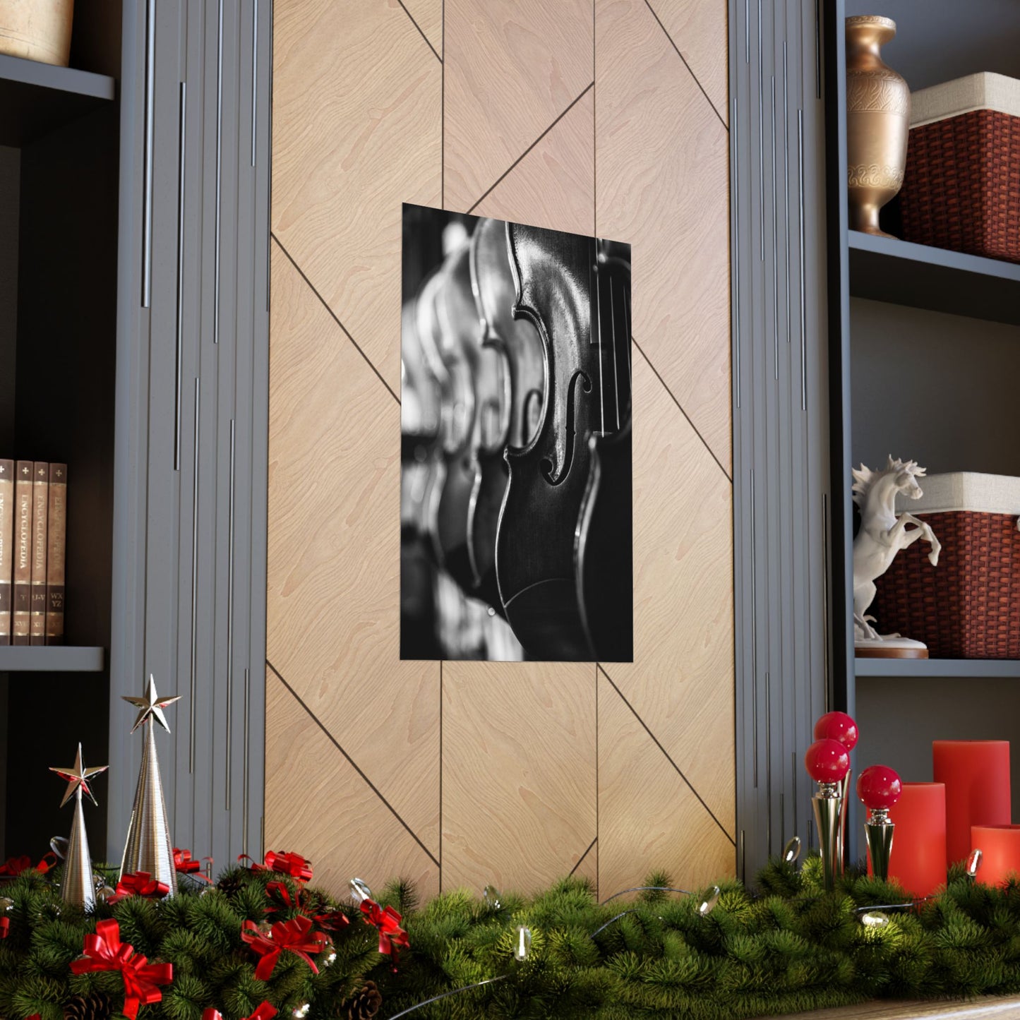 Decorative wall art of a violin on a wooden wall with festive decorations at the bottom.