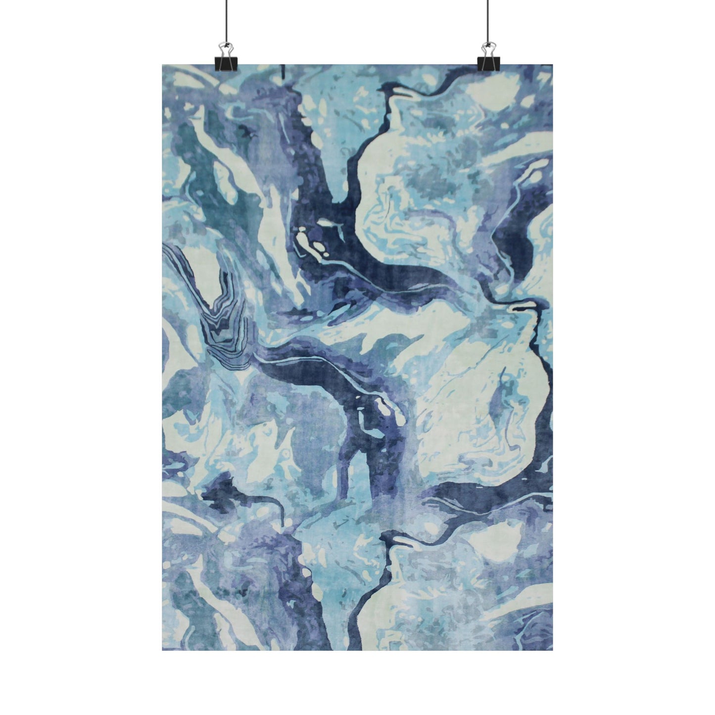 Abstract blue and white patterned fabric on a white background