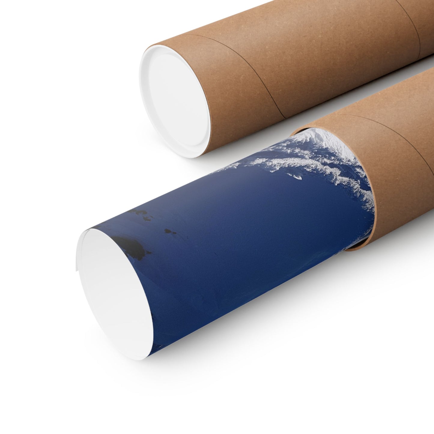 Two cardboard tubes with one partially unrolled to reveal a blue surface with white patterns.