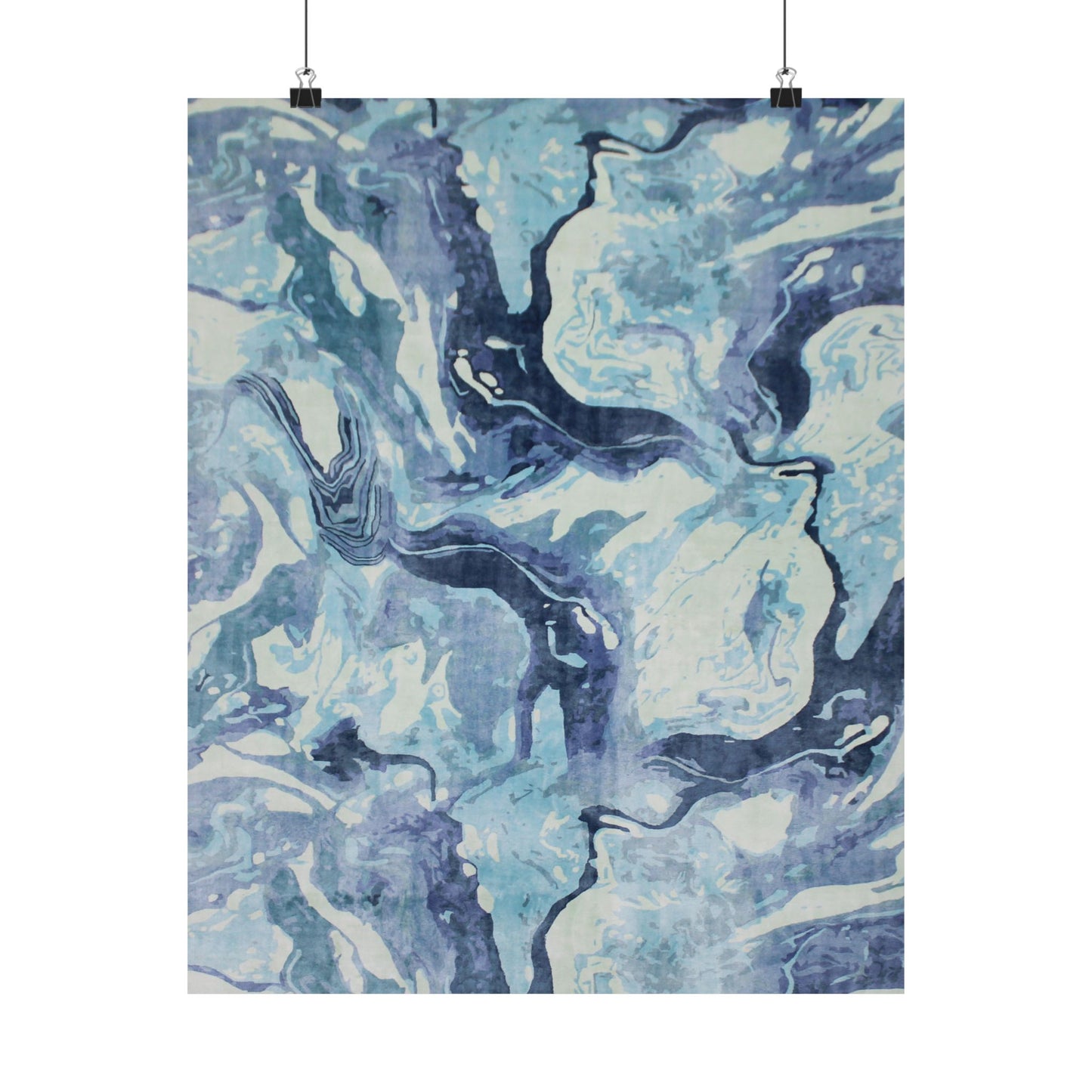 Abstract blue and white patterned fabric on a white background