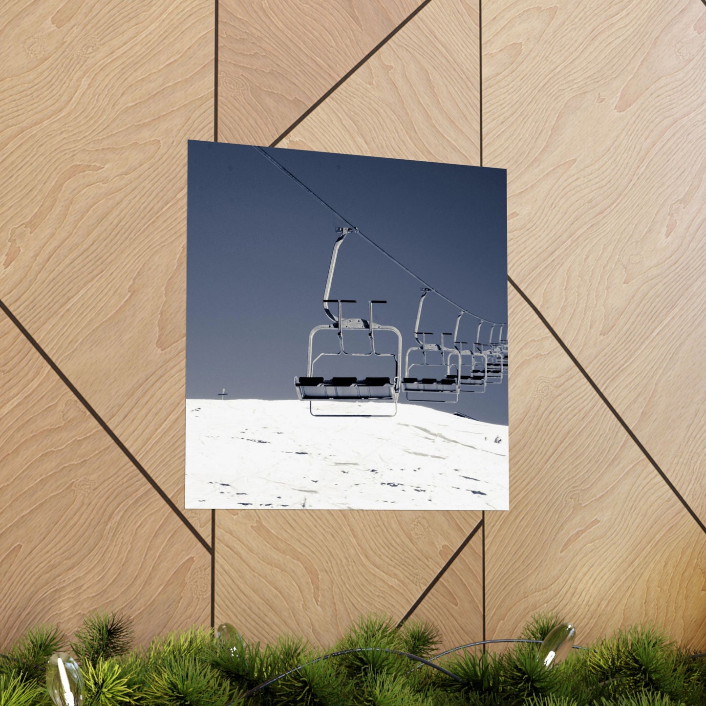 Ski lift poster on a wooden surface with grass at the bottom