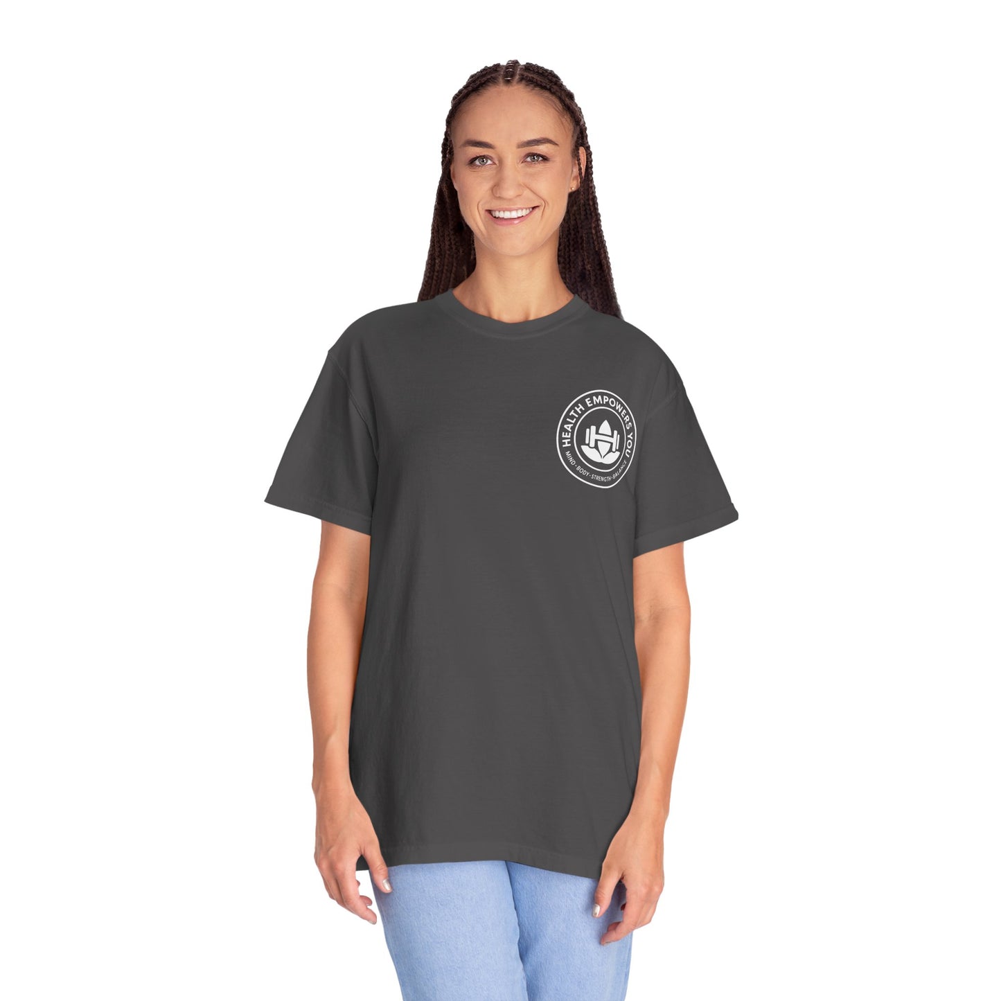 Person wearing a dark gray t-shirt with a logo on a white background