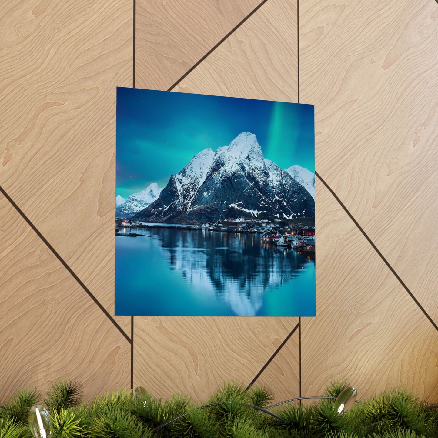 Poster of a mountain and lake scene on a wooden surface