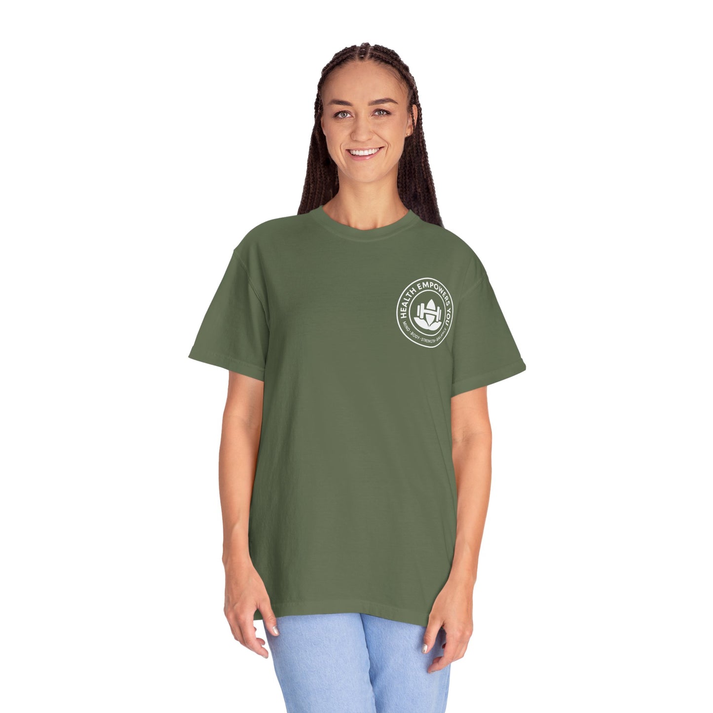 Person wearing a green t-shirt with a logo on a white background