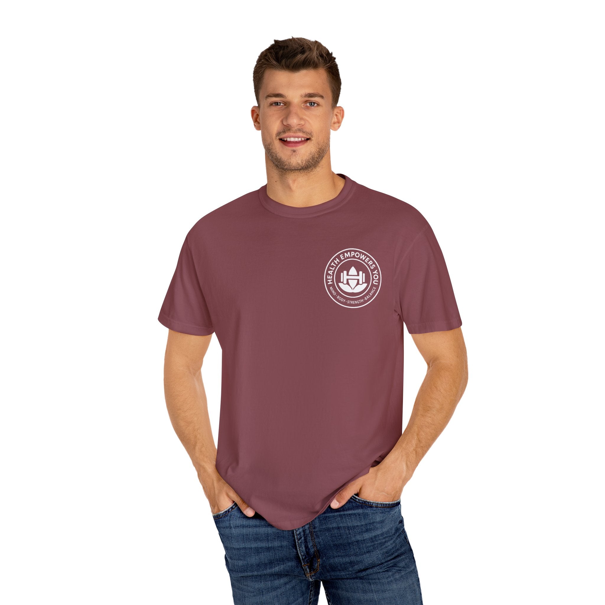 Man wearing a maroon t-shirt with a logo on a white background