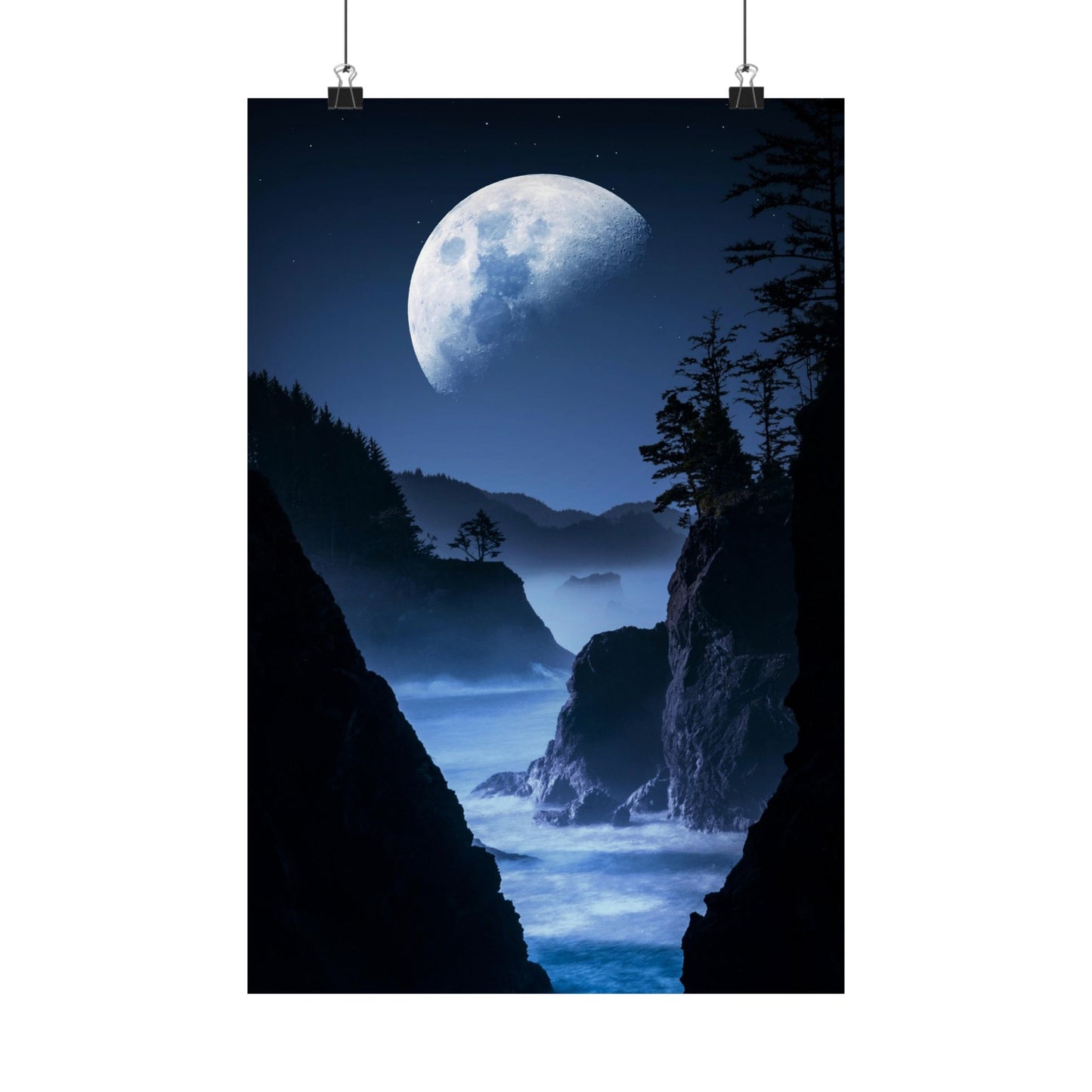 Mountainous landscape with a large moon in the sky