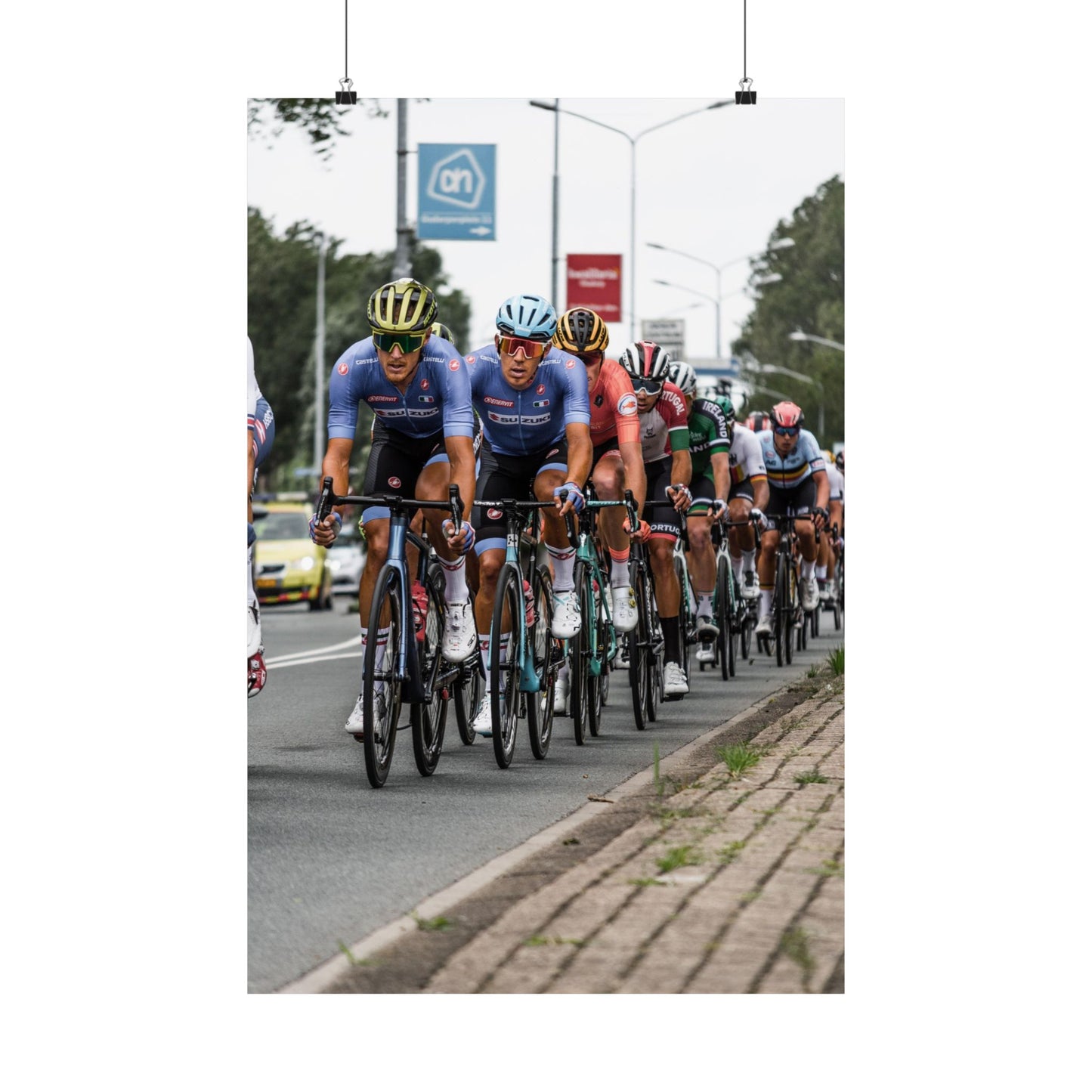 Cycling race with multiple cyclists on a road