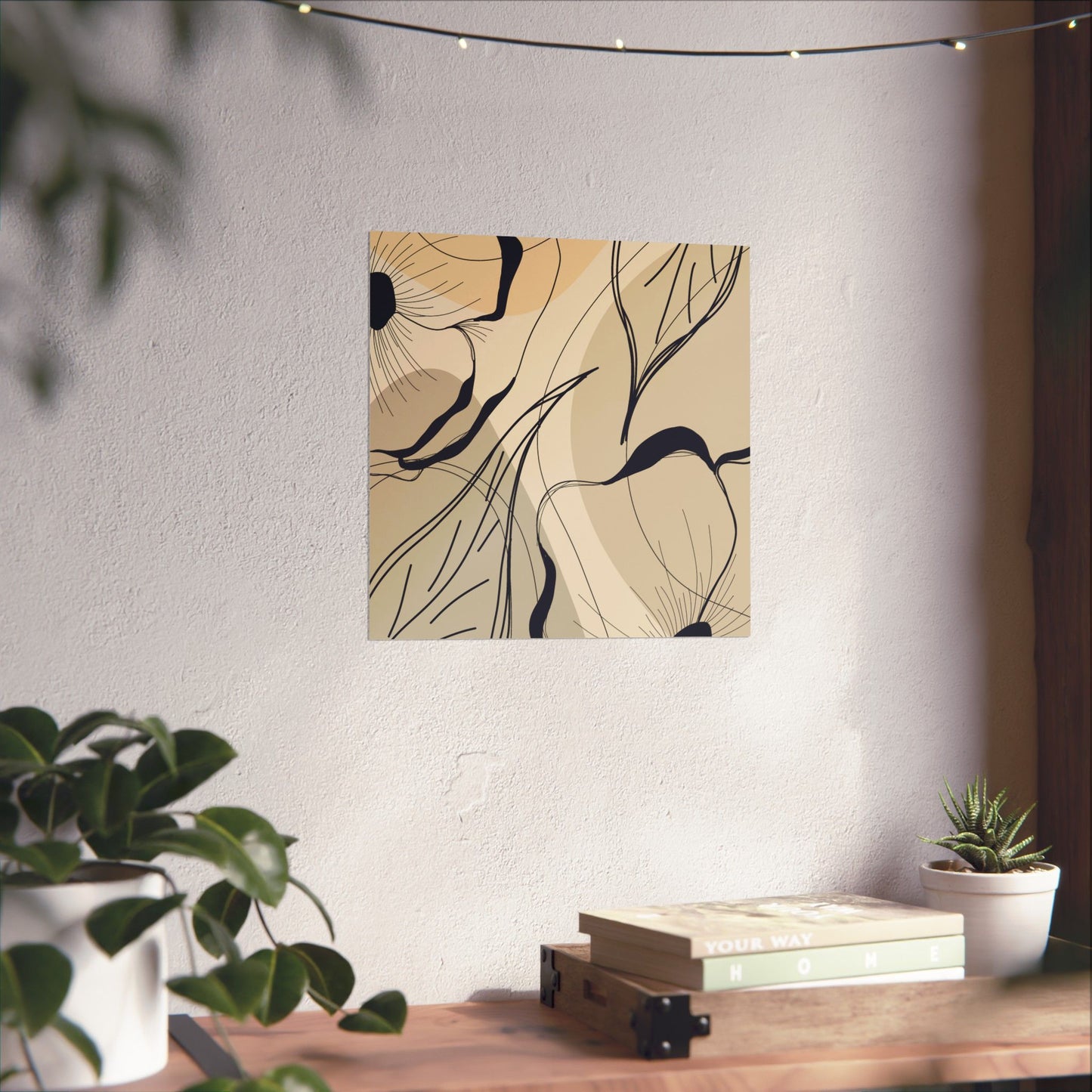 Abstract floral artwork on a wall with a wooden table and plants below