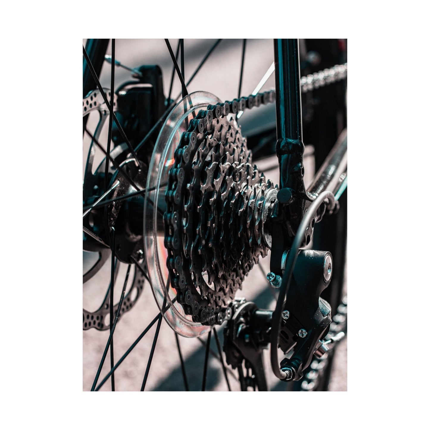 Close-up of a bicycle gear system with a blurred background
