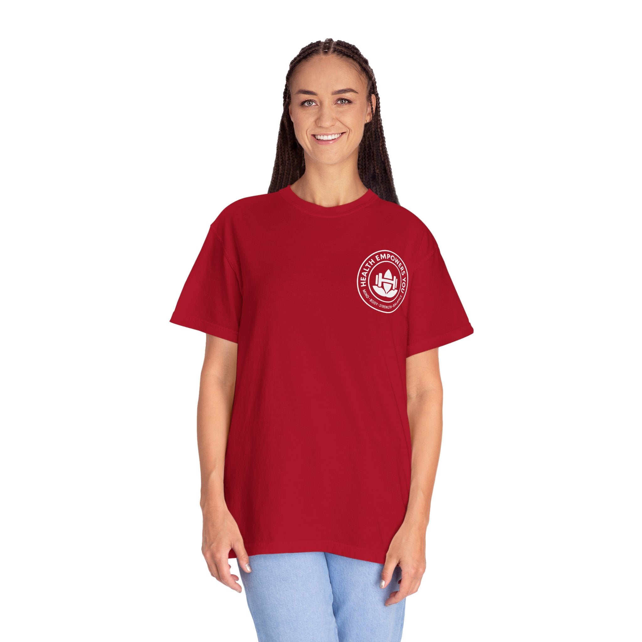 Person wearing a red t-shirt with a logo on a white background