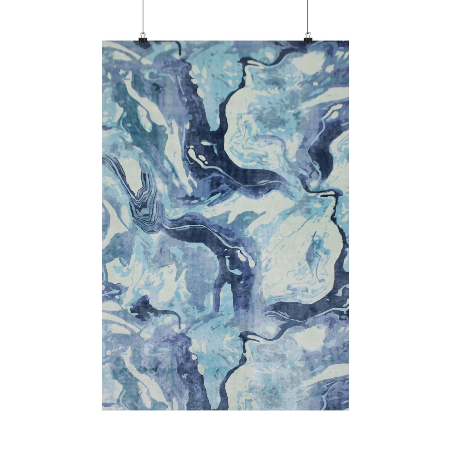 Abstract blue and white patterned fabric on a white background