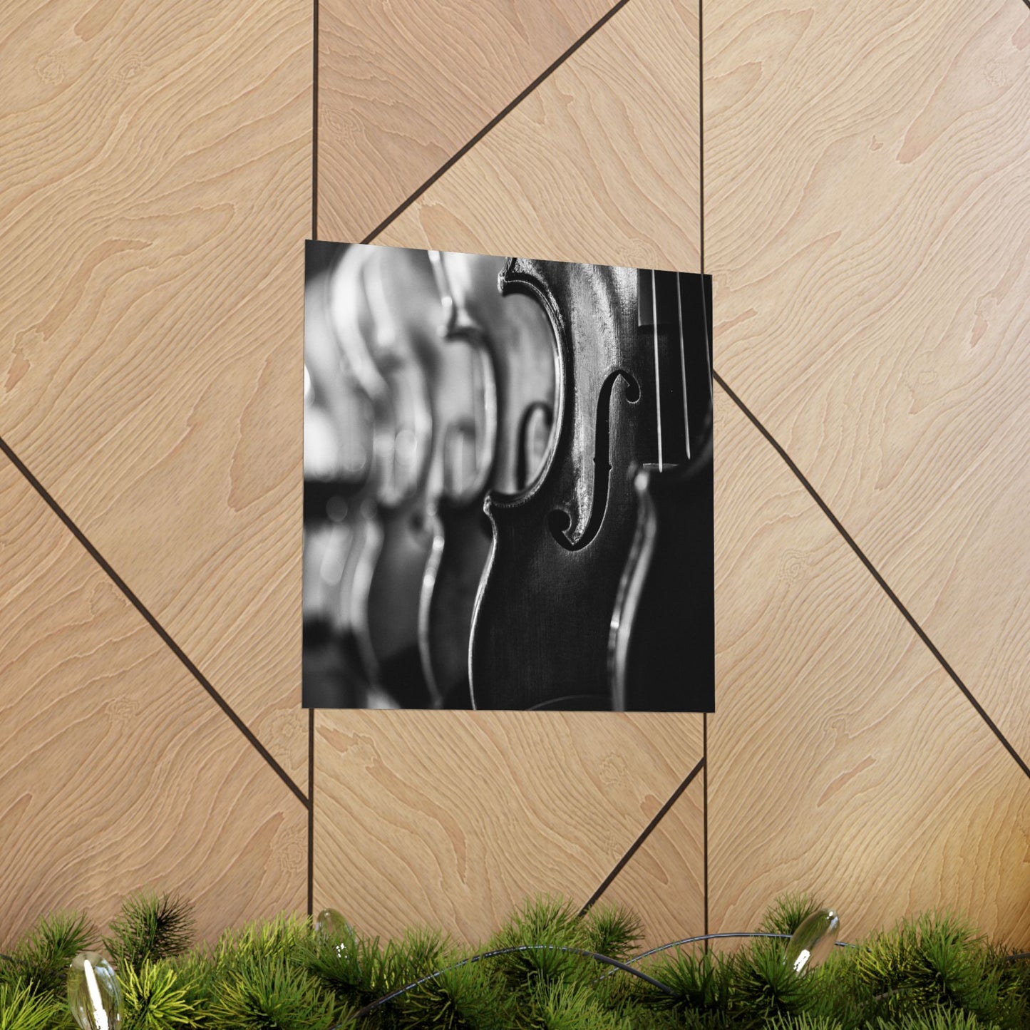 Close-up of a violin's f-holes on a wooden panel with geometric patterns