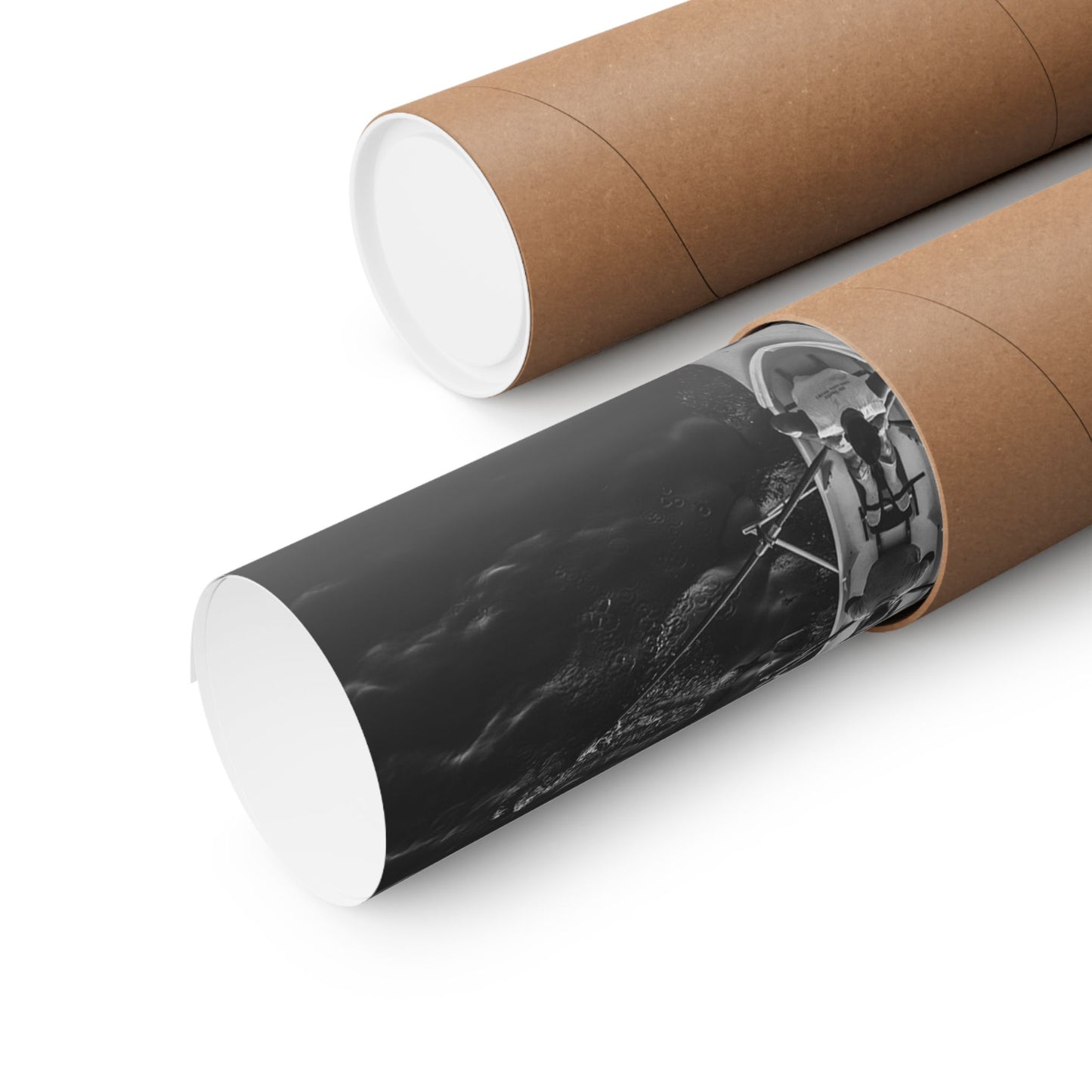 Roll of black and white print on a cardboard tube with white ends.