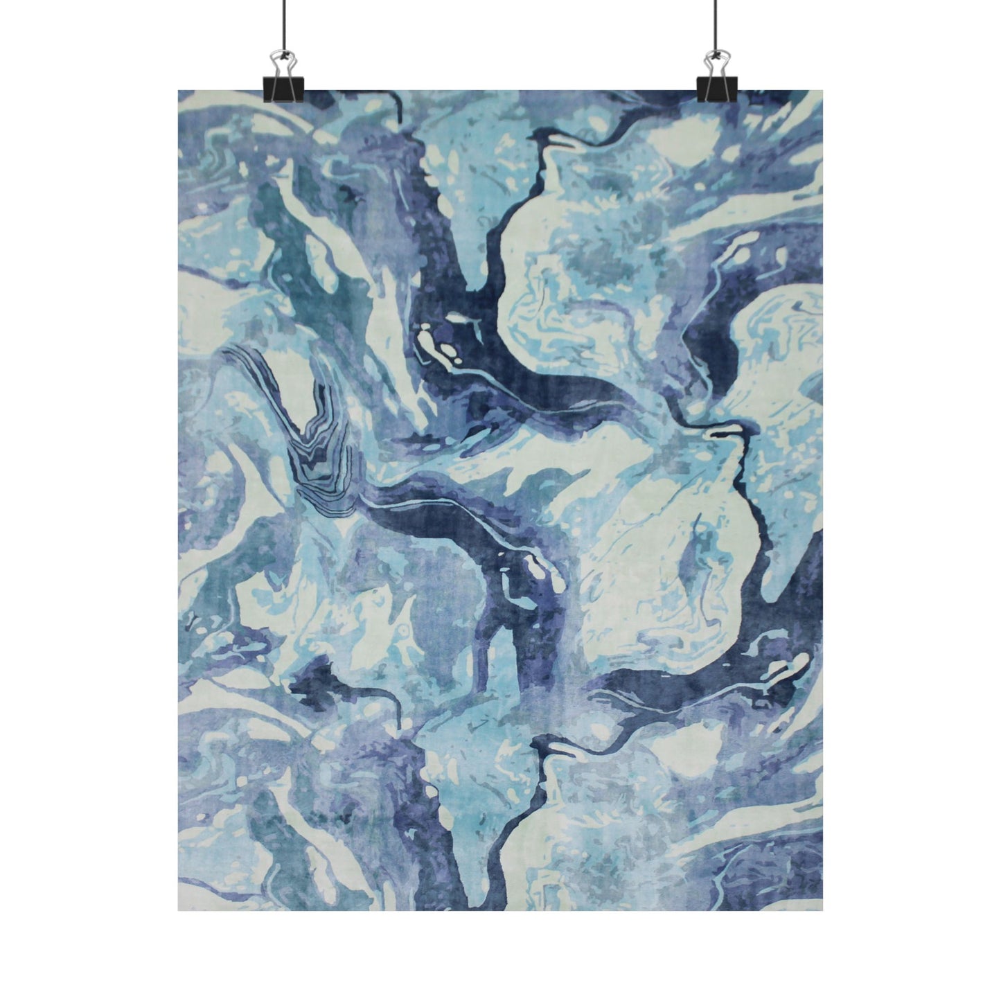Abstract blue and white patterned fabric on a white background