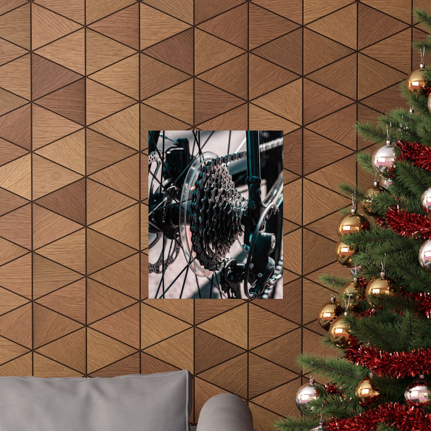 Decorative wall with geometric pattern, framed picture, and Christmas tree with ornaments.