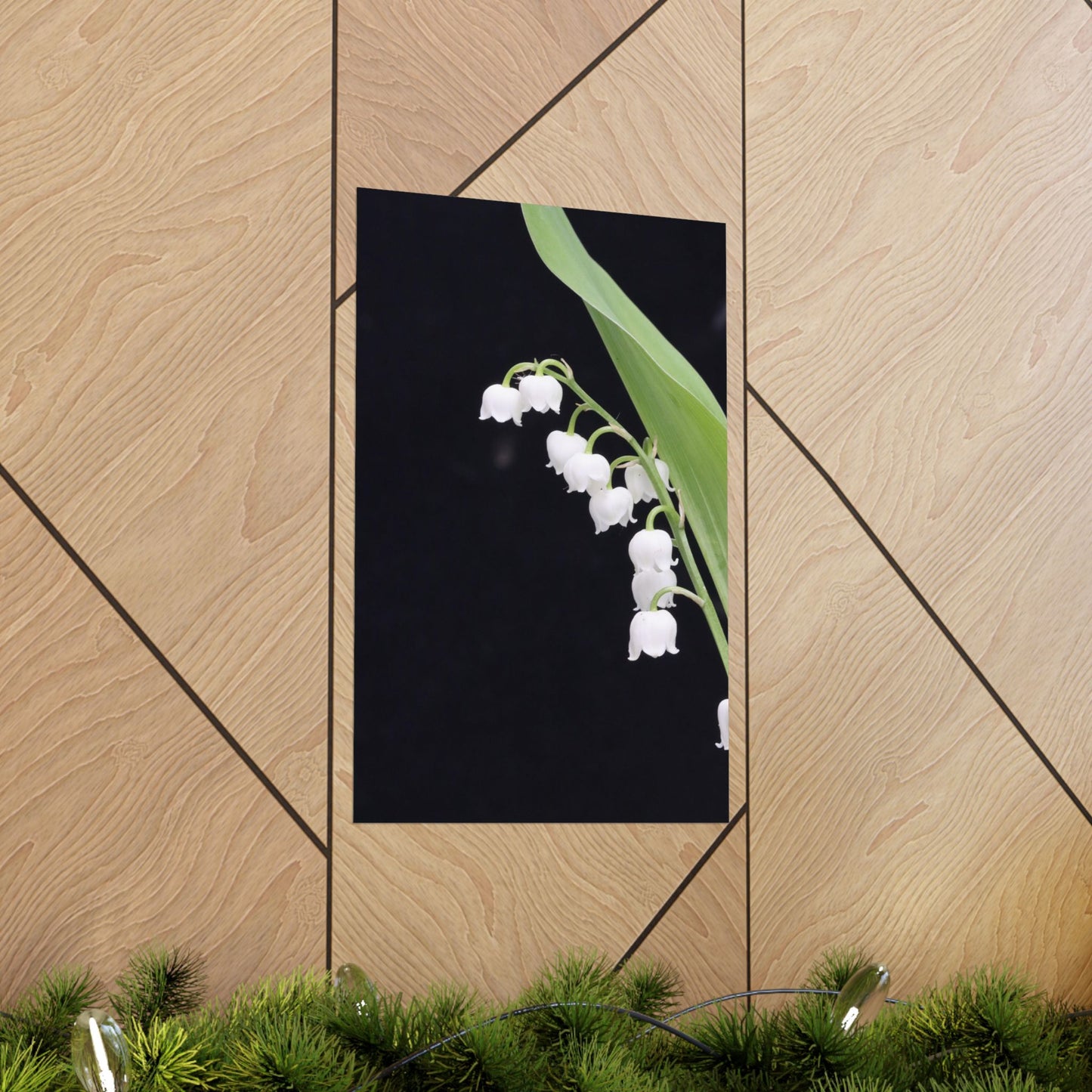 Decorative mirror with a floral design on a wooden wall
