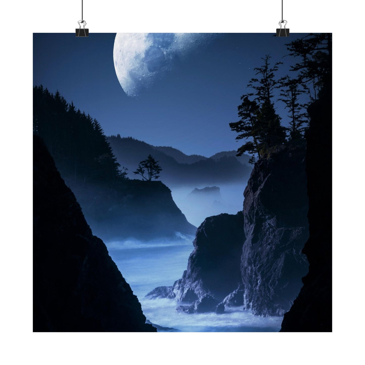 Majestic coastal scene with moonlit sky and rugged cliffs.