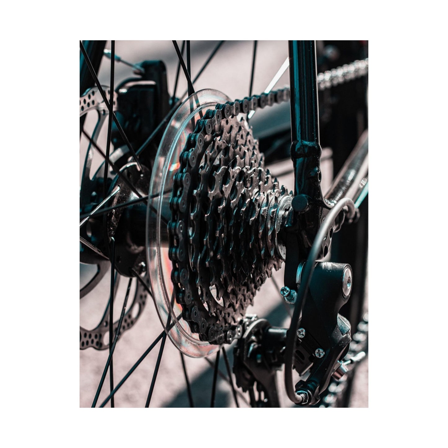 Close-up of a bicycle gear system with chain and sprockets.