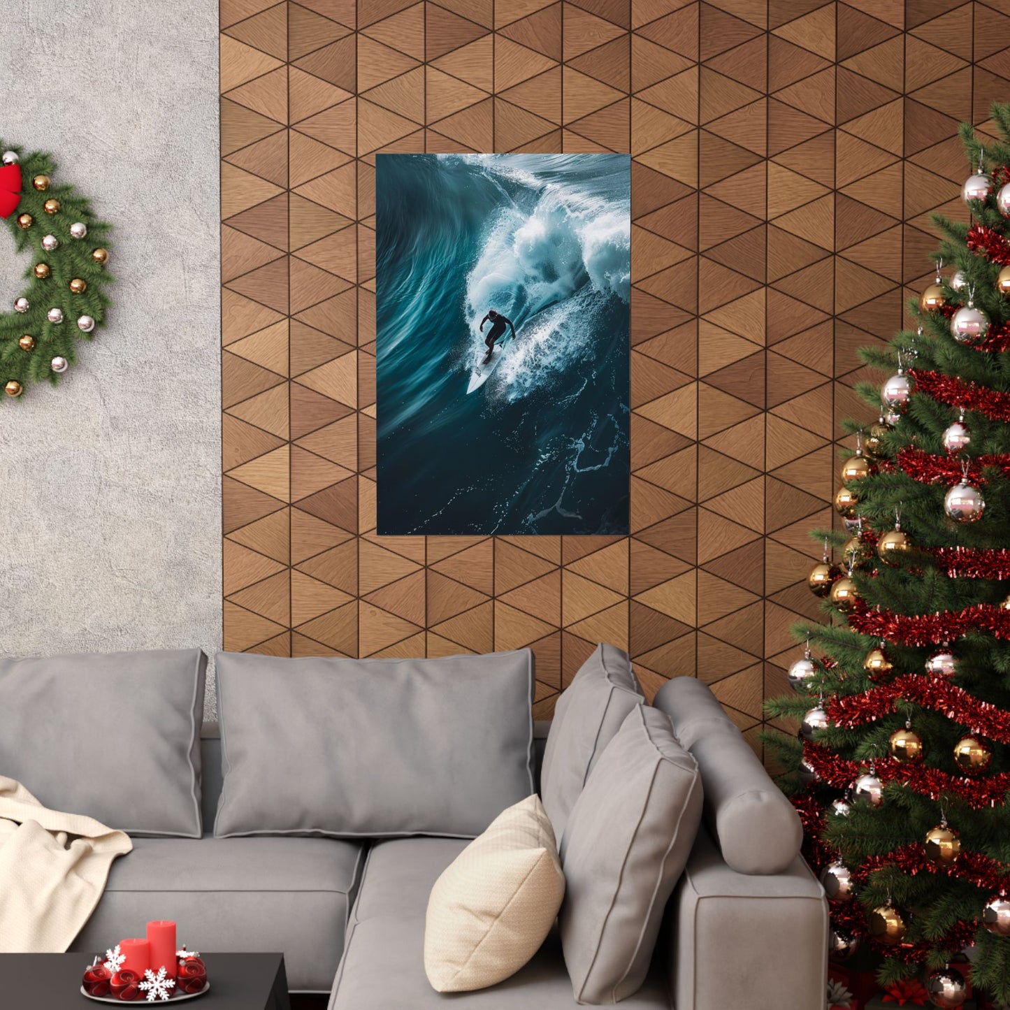 Living room with a gray sofa, Christmas tree, and wall art of a surfer.
