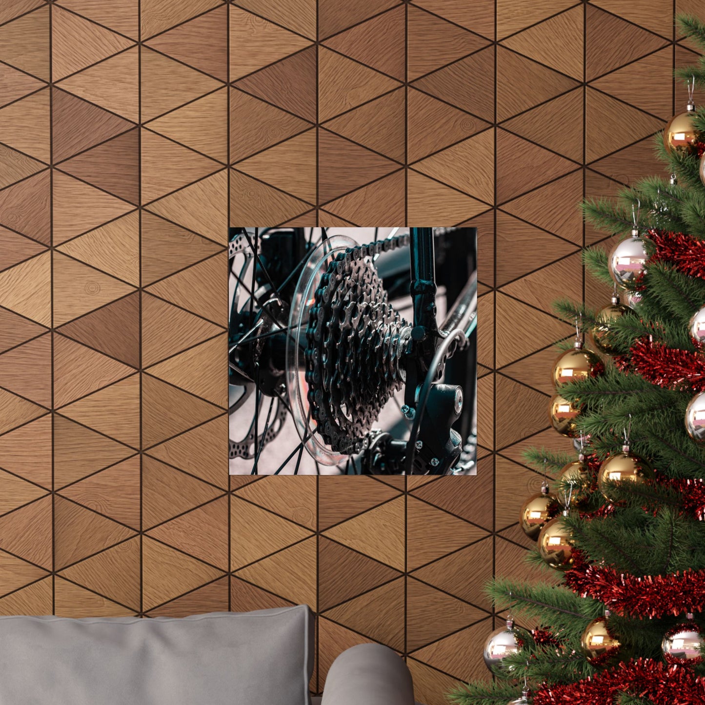 Wooden wall with geometric pattern, mirror reflecting bicycle gear, and Christmas tree with decorations.