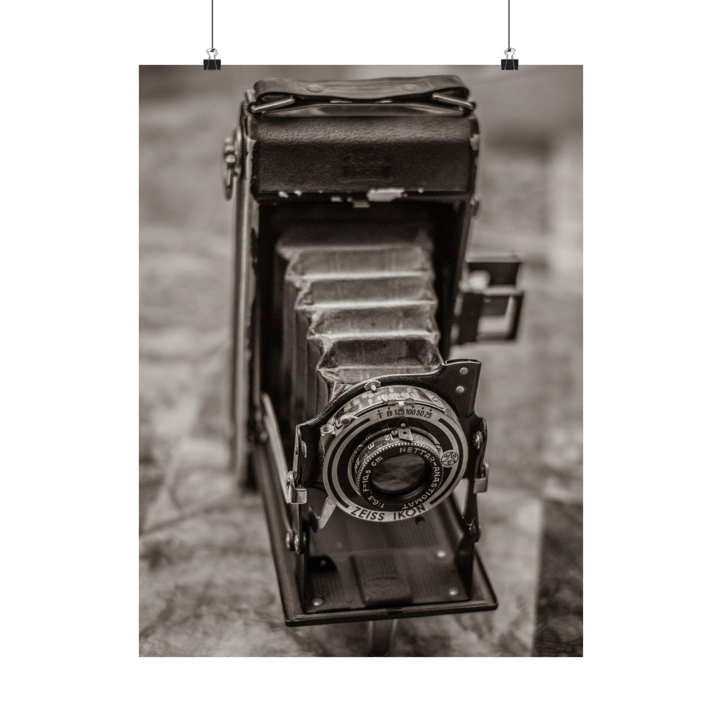 Vintage camera in black and white on a textured background
