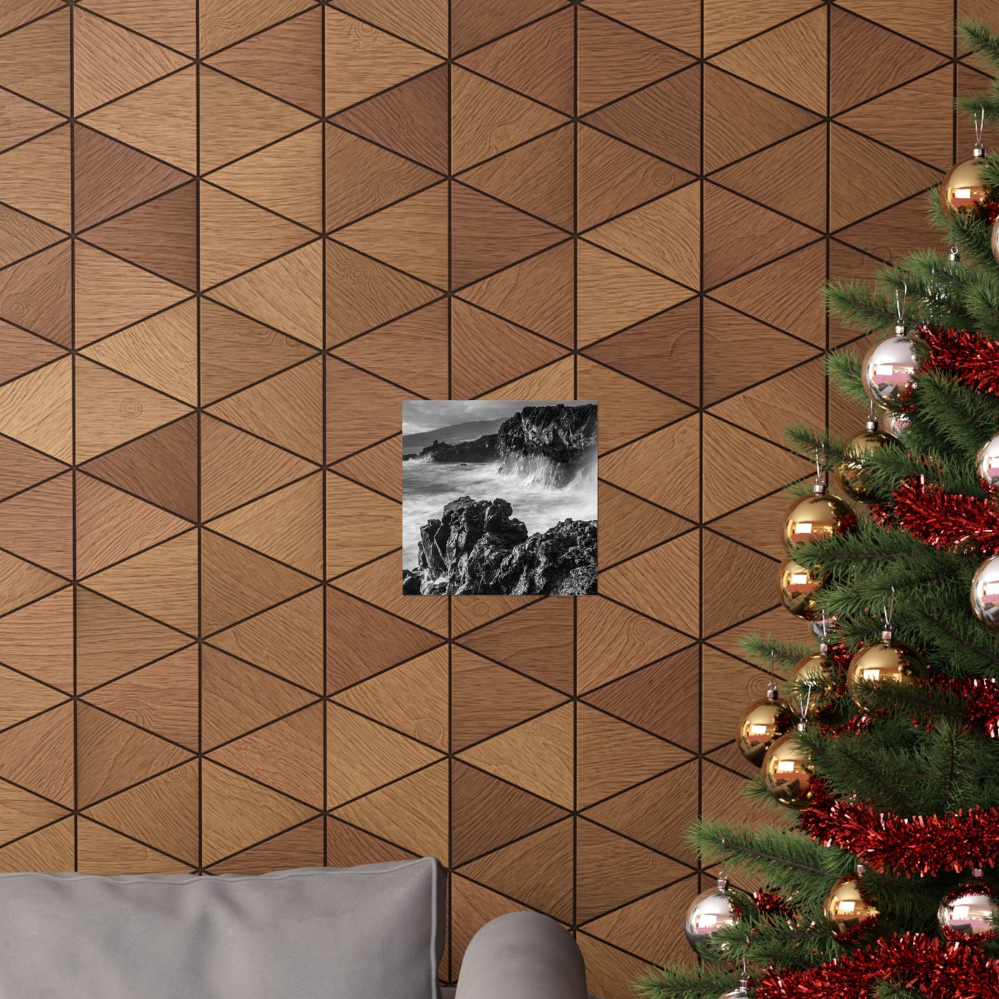 Wooden geometric wall paneling with a Christmas tree and decorative items.